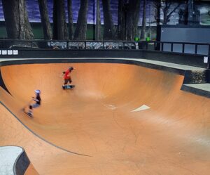 Skating around the bowl section at Rush Skatepark Stroud